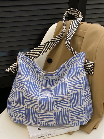 Expertly designed for daily use, the Chic Checkered Striped Geometric Shoulder Tote is a stylish and practical addition to any wardrobe. With a trendy checkered and striped geometric print, this tote is perfect for adding a touch of sophistication to any outfit. Its spacious interior and durable design make it ideal for all your daily essentials. Upgrade your daily style with this must-have tote.