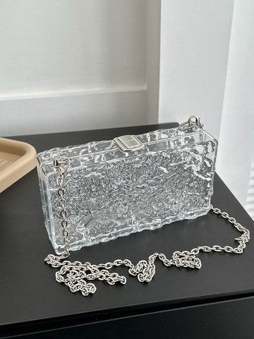 Stay stylish this summer with our Chic Clear Chain Crossbody Bag, the must-have accessory for women. The clear chain design adds a touch of sophistication to any outfit while keeping your essentials within reach. Upgrade your summer wardrobe with this perfect accessory.