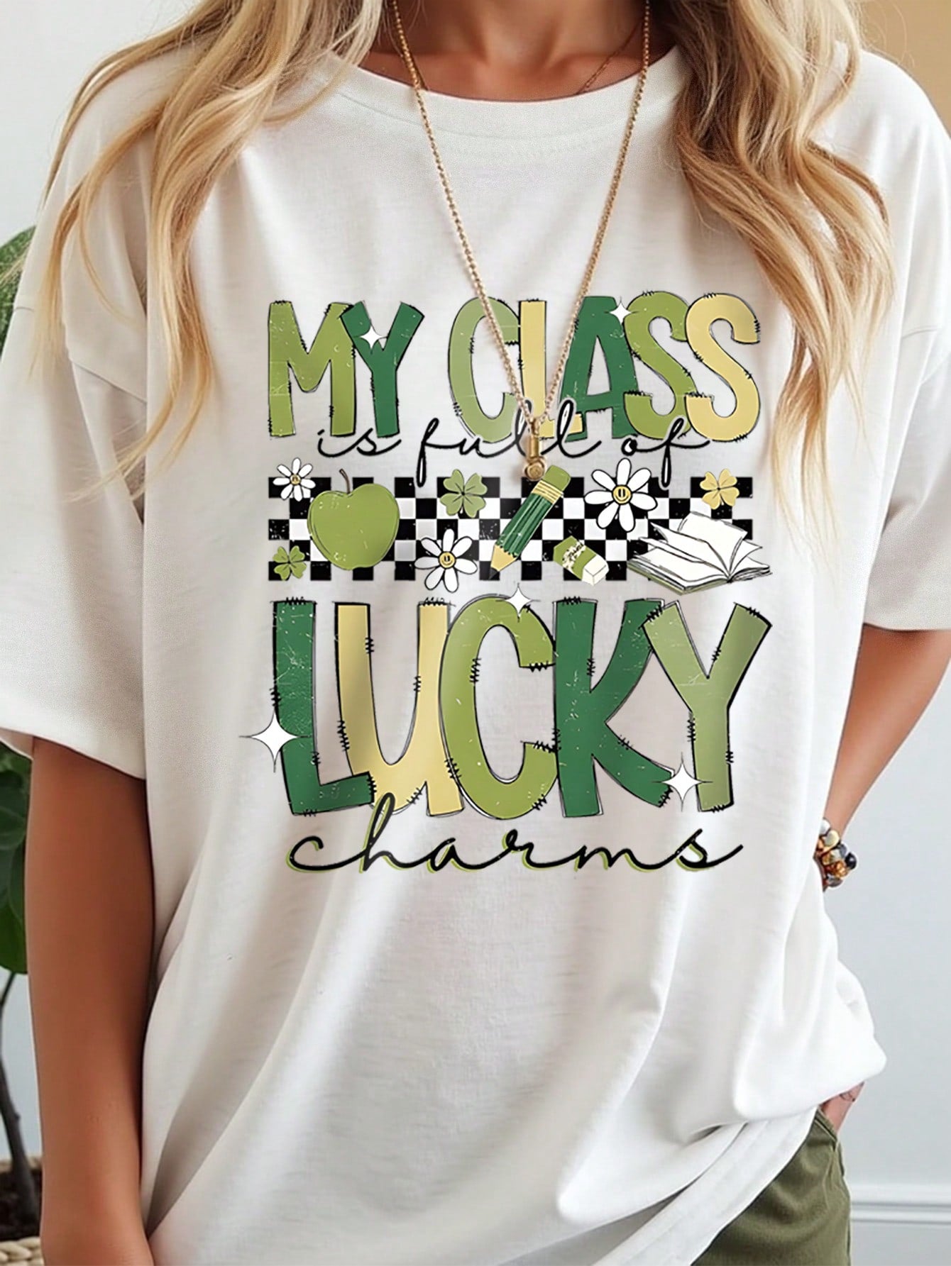 Get lucky with this Chic Clover Graphic Tee! Perfect for St. Patrick's Day and the school season, this trendy shirt will have you feeling stylish and fortunate. Embrace your inner Irish and stand out in this fun and playful tee.