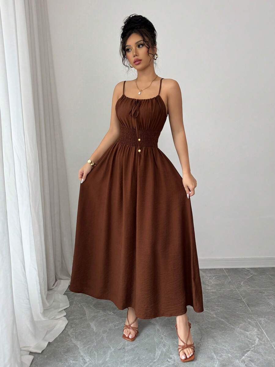 This coffee-colored linen swing dress brings playful charm to your warm-weather wardrobe. Featuring a cute bowknot detail and airy fabric, it keeps you cool while turning heads. Perfect for sunny days when effortless style meets comfy vibes. Slip into this dress and let your spring and summer adventures begin!