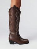 Step into whimsical charm with these Chic Coffee Brown Embroidered Knee-High Boots. Perfect for spring and autumn, their Mori-inspired style brings a cozy yet spirited vibe to your wardrobe. The intricate embroidery adds a delightful touch while the knee-high design keeps you stylishly snug. Whether wandering city streets or forest trails, these boots make every step an adventure.