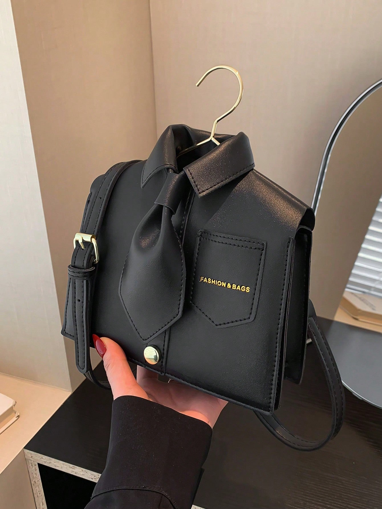 Stay stylish and hands-free with our Chic Collar Crossbody. This versatile accessory not only complements any outfit, but also doubles as a phone holder. With its sleek and functional design, you'll always have your phone within reach without sacrificing fashion.