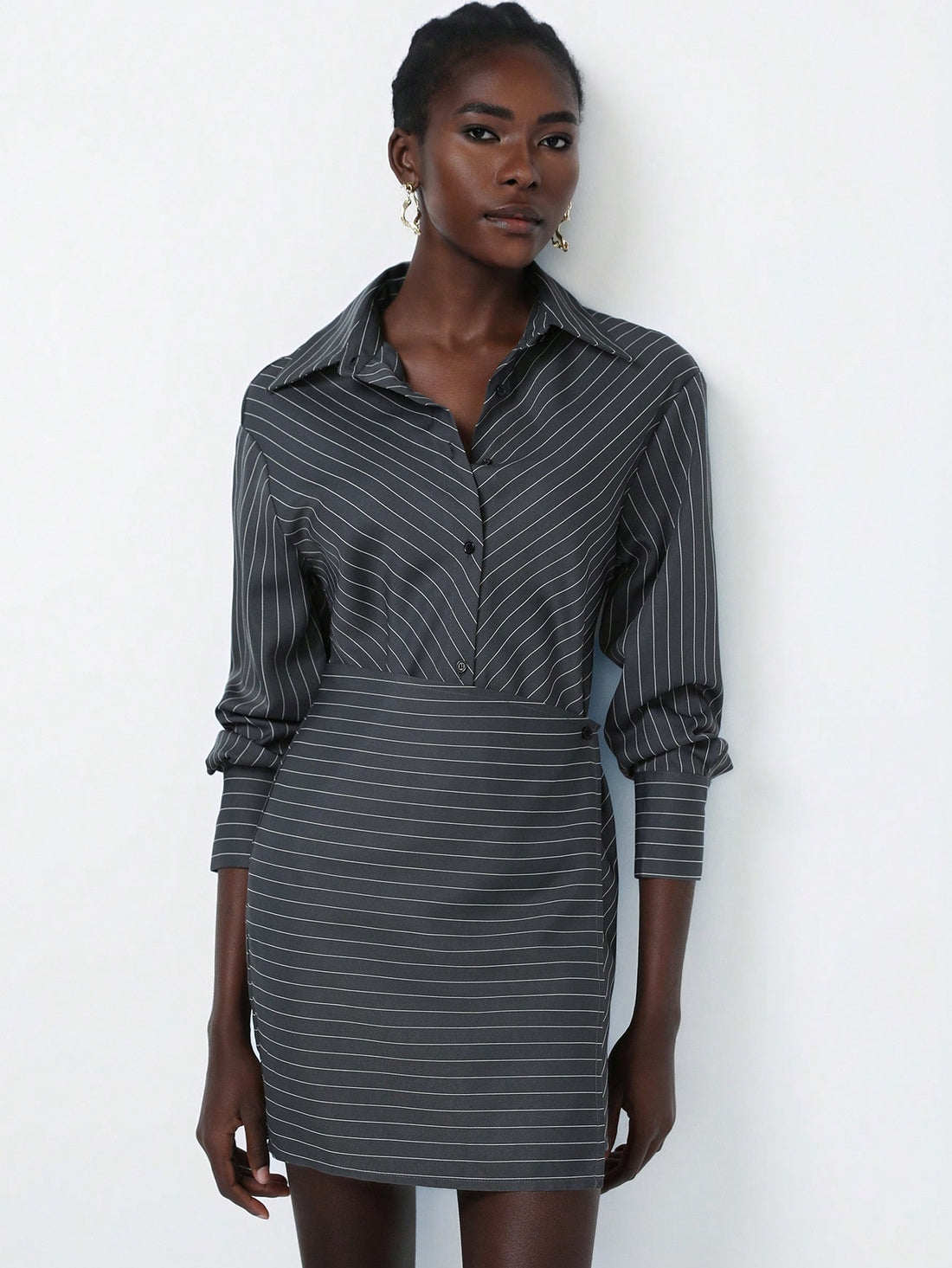 This dress is perfect for college gals looking to make a statement! With its chic v-neck design and trendy color block pattern, you'll stand out from the crowd. The asymmetrical hem adds a unique touch that's sure to catch eyes. Stay stylish, stay sassy, stay you.