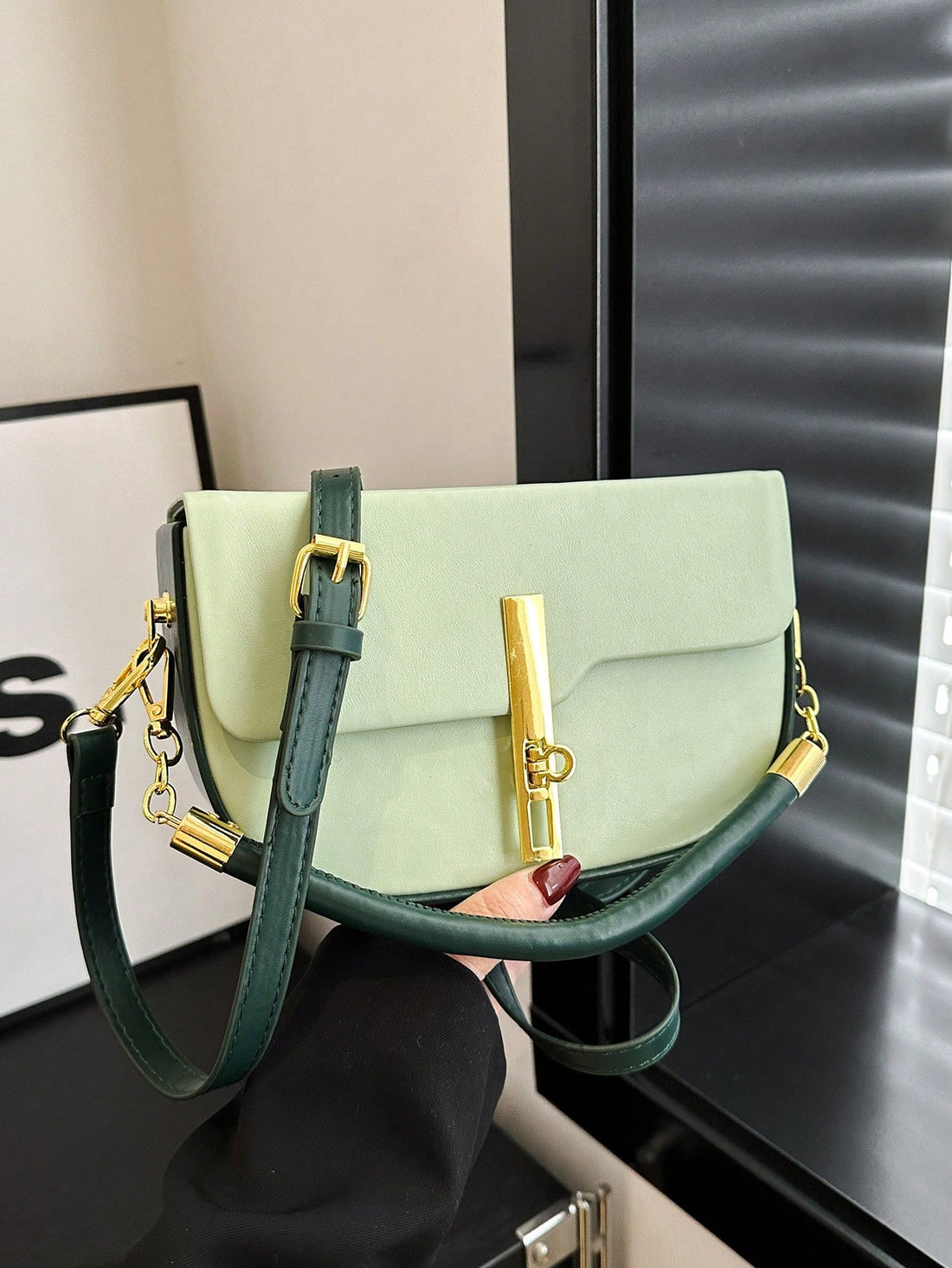 Upgrade your work attire with the Chic Color Block Commuter Satchel. Its stylish design and easy-to-use flap closure make it perfect for the modern professional. Stay organized and look fashionable with this must-have work bag.