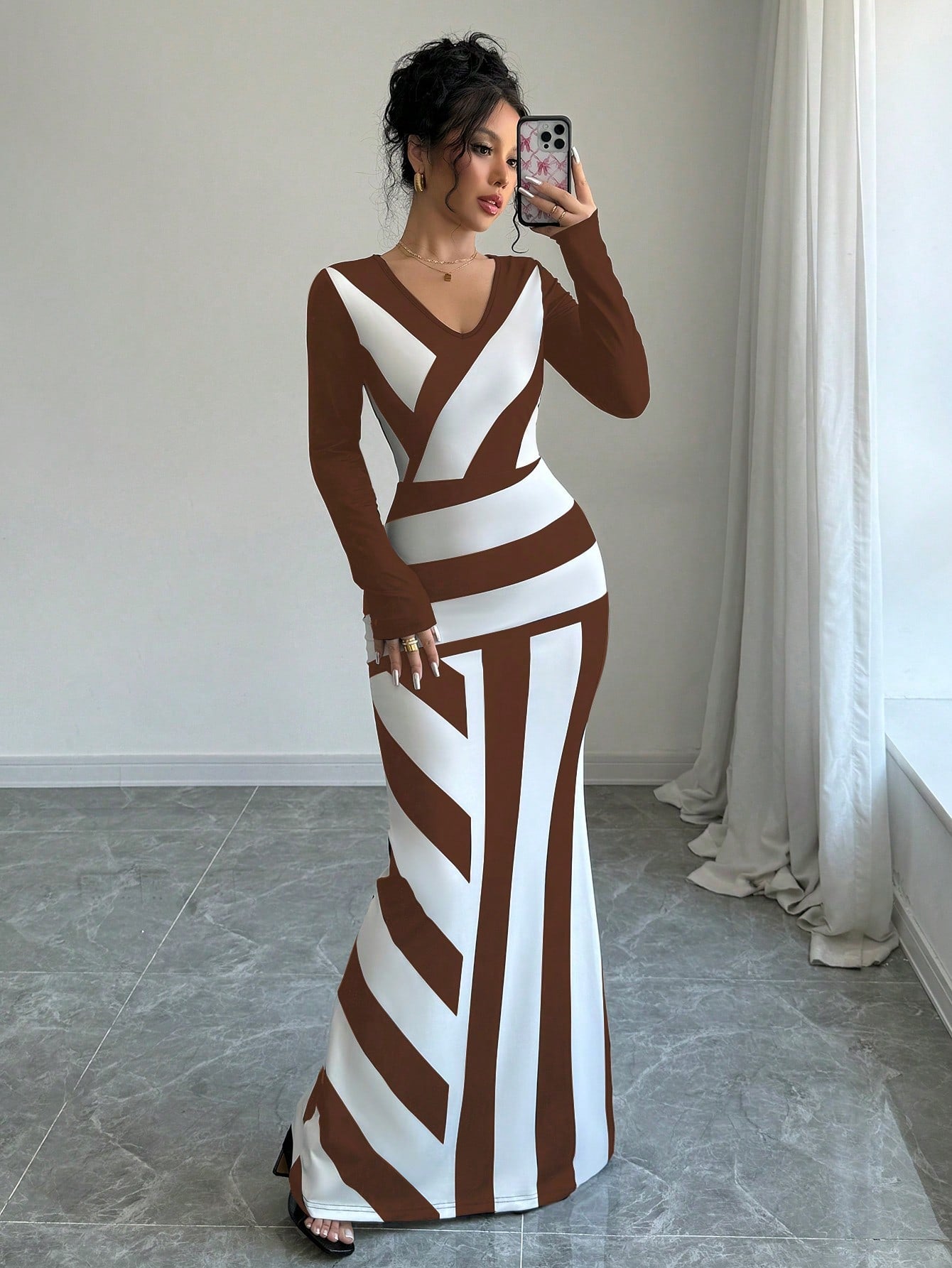Elevate your style with our elegant Chic Colorblock Striped V-Neck Fish Tail Dress. Featuring a flattering fitted design and extra long length, this dress is perfect for any occasion. With a bold color block and stylish stripes, you'll make a statement without saying a word.
