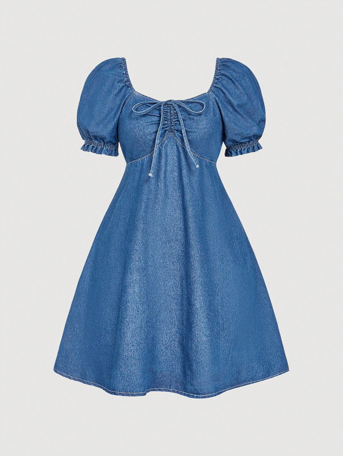 This short-sleeve denim dress is here to add a little comfort to your wardrobe. With the perfect mix of chic and casual, this dress is perfect for any occasion. Plus, it even comes with built-in shorts for added convenience. Talk about a fashion-forward win!