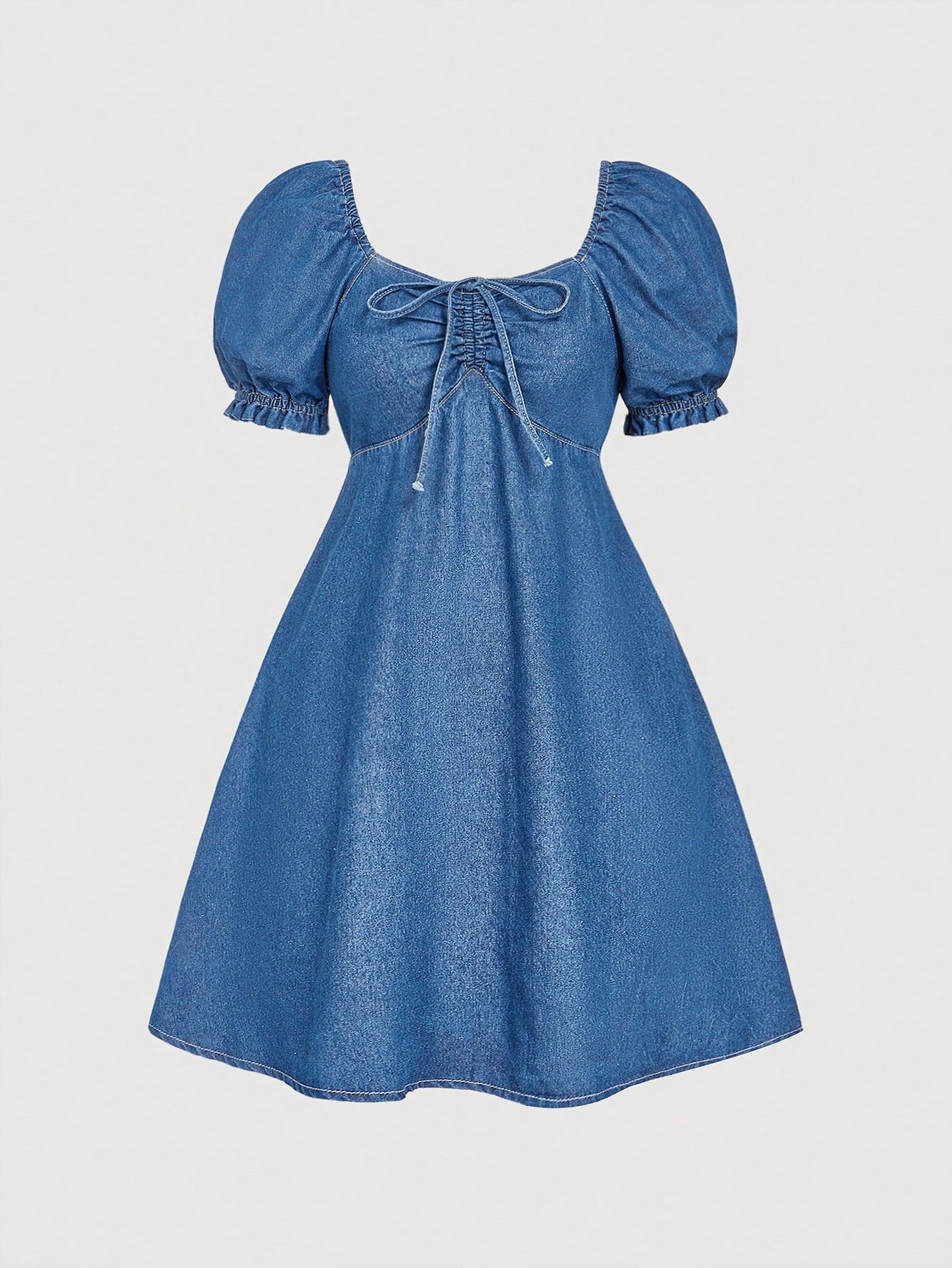 This short-sleeve denim dress is here to add a little comfort to your wardrobe. With the perfect mix of chic and casual, this dress is perfect for any occasion. Plus, it even comes with built-in shorts for added convenience. Talk about a fashion-forward win!