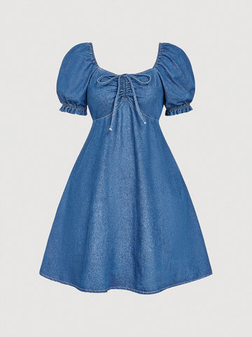 This short-sleeve denim dress is here to add a little comfort to your wardrobe. With the perfect mix of chic and casual, this dress is perfect for any occasion. Plus, it even comes with built-in shorts for added convenience. Talk about a fashion-forward win!