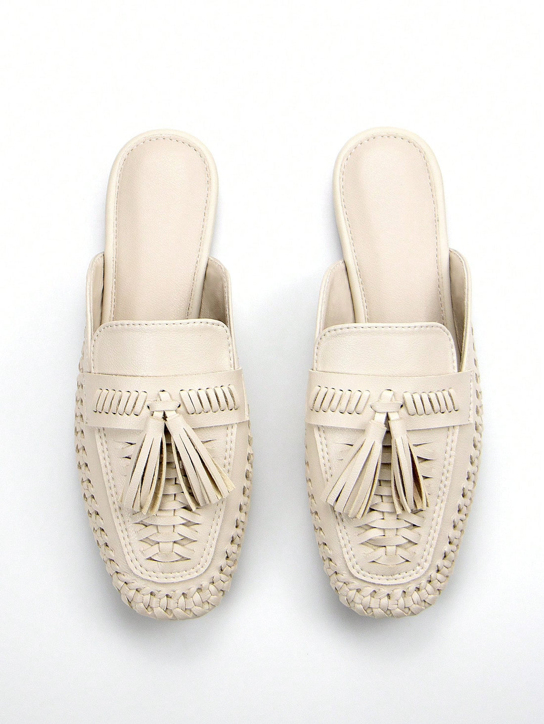 Experience comfort and style with Chic Comfort Beige Crinkled Microfiber Loafers. The hand-woven slip-on design and soft microfiber material provide the perfect combination of ease and elegance. Say goodbye to uncomfortable shoes and hello to effortless fashion!