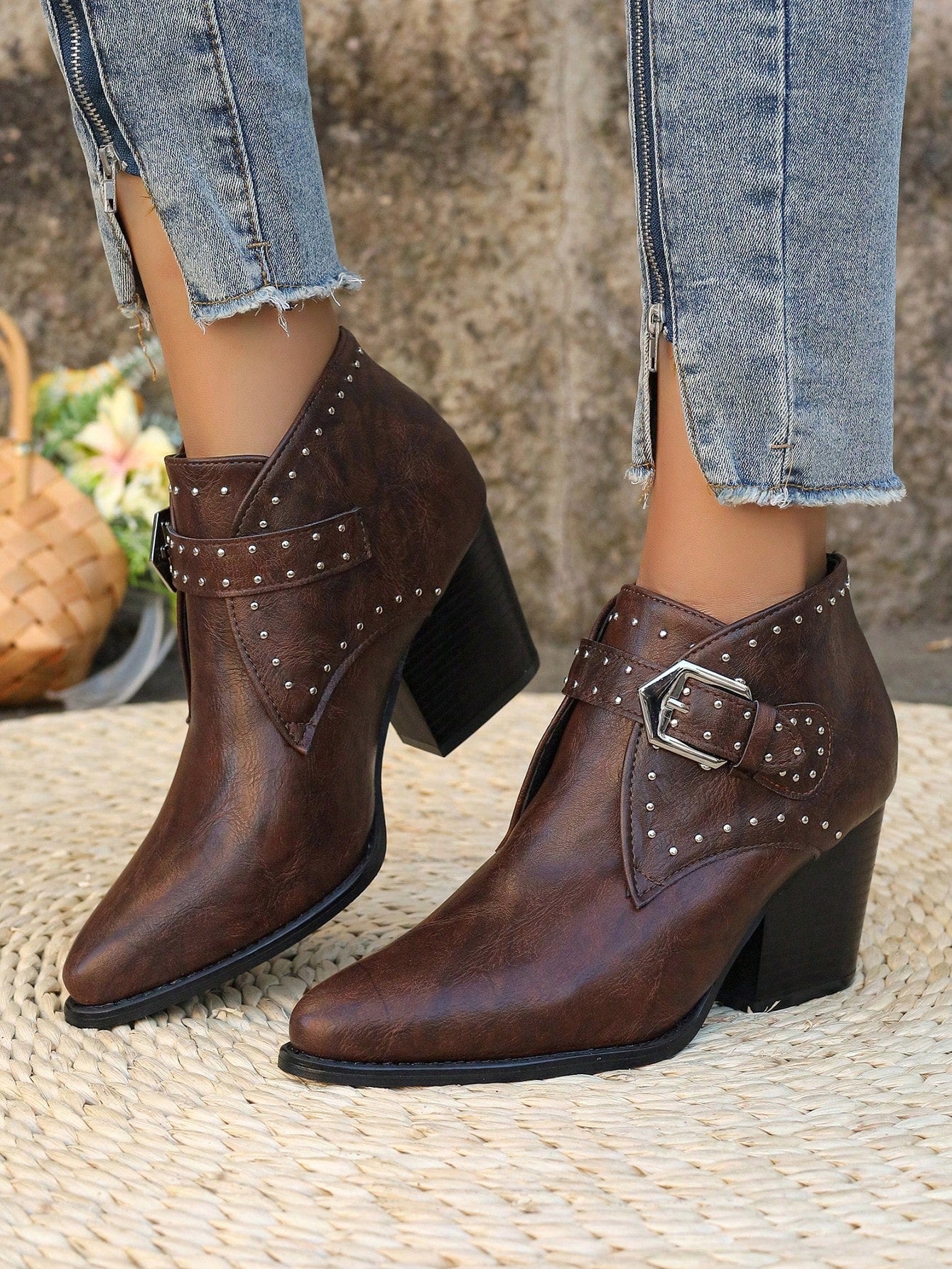 Stay warm and stylish in the Chic Comfort ankle boot. The fuzzy-lined interior provides cozy comfort while the thick sole and high heel offer support and elevation. The Chelsea style adds a touch of sophistication to any outfit. Perfect for those looking for both fashion and function.