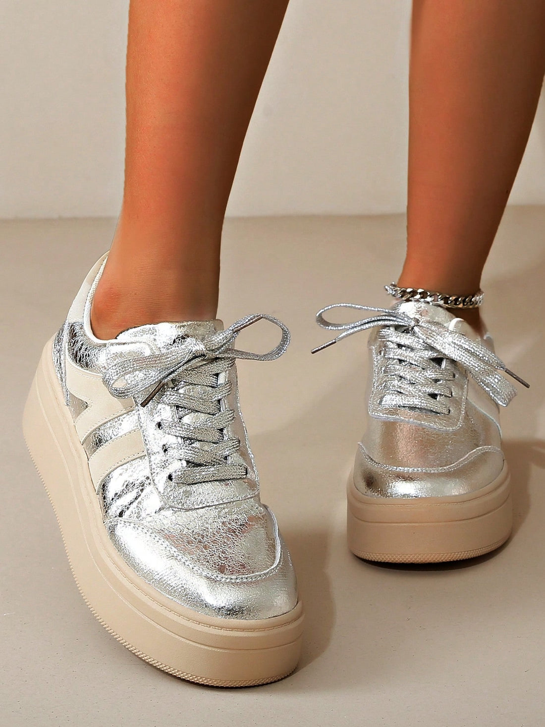 Step up your daily wear game with these Chic & Comfortable Lace-Up Sports Shoes! The thick sole provides both style and comfort, while the lace-up design ensures a perfect fit. Perfect for any occasion, these shoes will elevate your look with their unique and fashionable design.