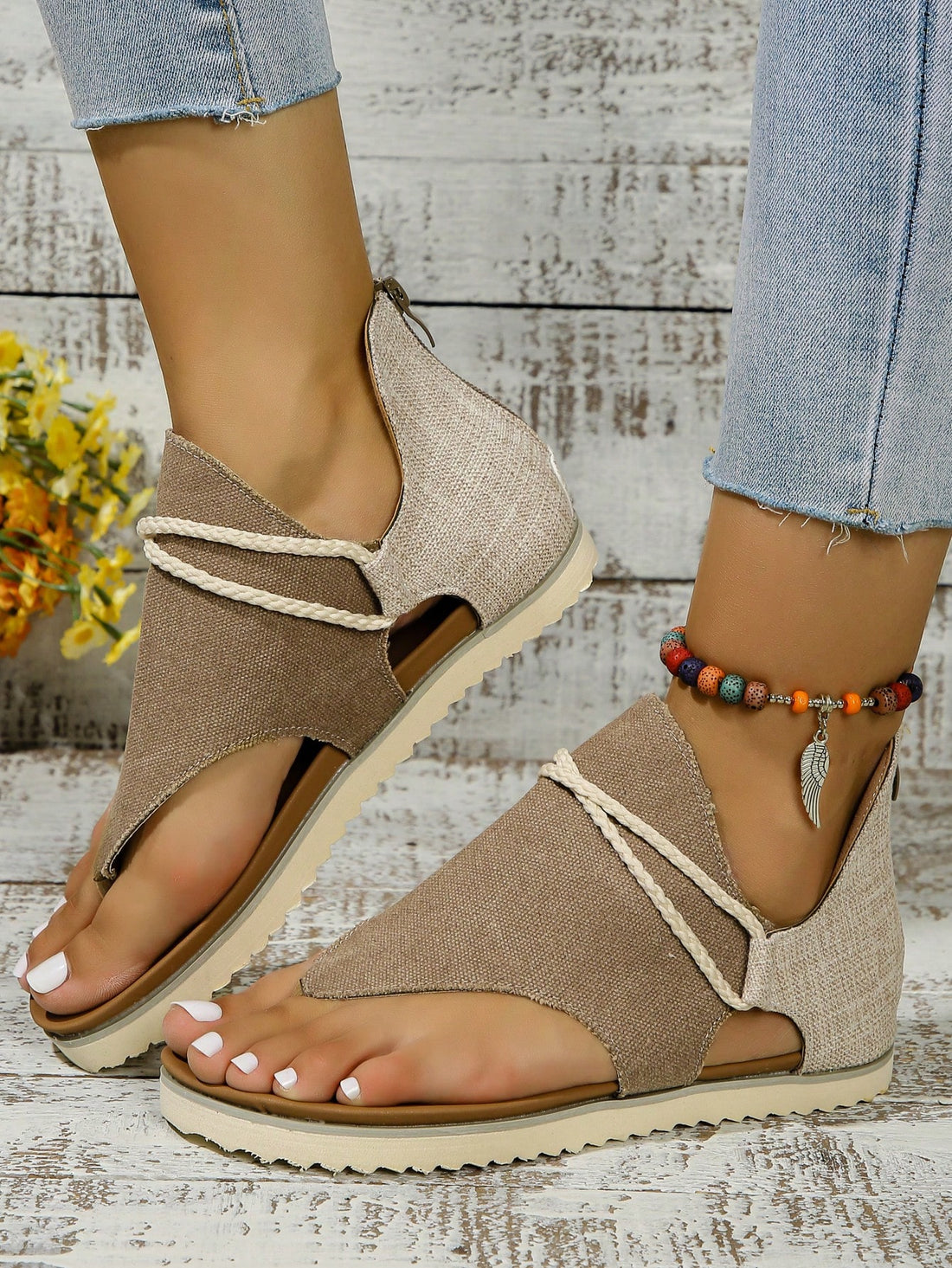 Get ready for your perfect beach vacation with these Chic & Comfy Beach Flat Sandals! With a stylish toe ring design, these sandals are not only fashionable but also comfortable for all-day wear. Don't forget to pack these as your perfect vacation companion!