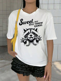 Effortless style and maximum comfort collide in our Chic & Comfy Raccoon Letter Print Tee. The minimalist design showcases the playful charm of these clever creatures, while the soft, lightweight fabric keeps you cool and comfortable all day long. Perfect for any casual occasion, this tee is a must-have for any stylish wardrobe.