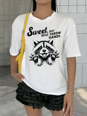 Effortless style and maximum comfort collide in our Chic & Comfy Raccoon Letter Print Tee. The minimalist design showcases the playful charm of these clever creatures, while the soft, lightweight fabric keeps you cool and comfortable all day long. Perfect for any casual occasion, this tee is a must-have for any stylish wardrobe.