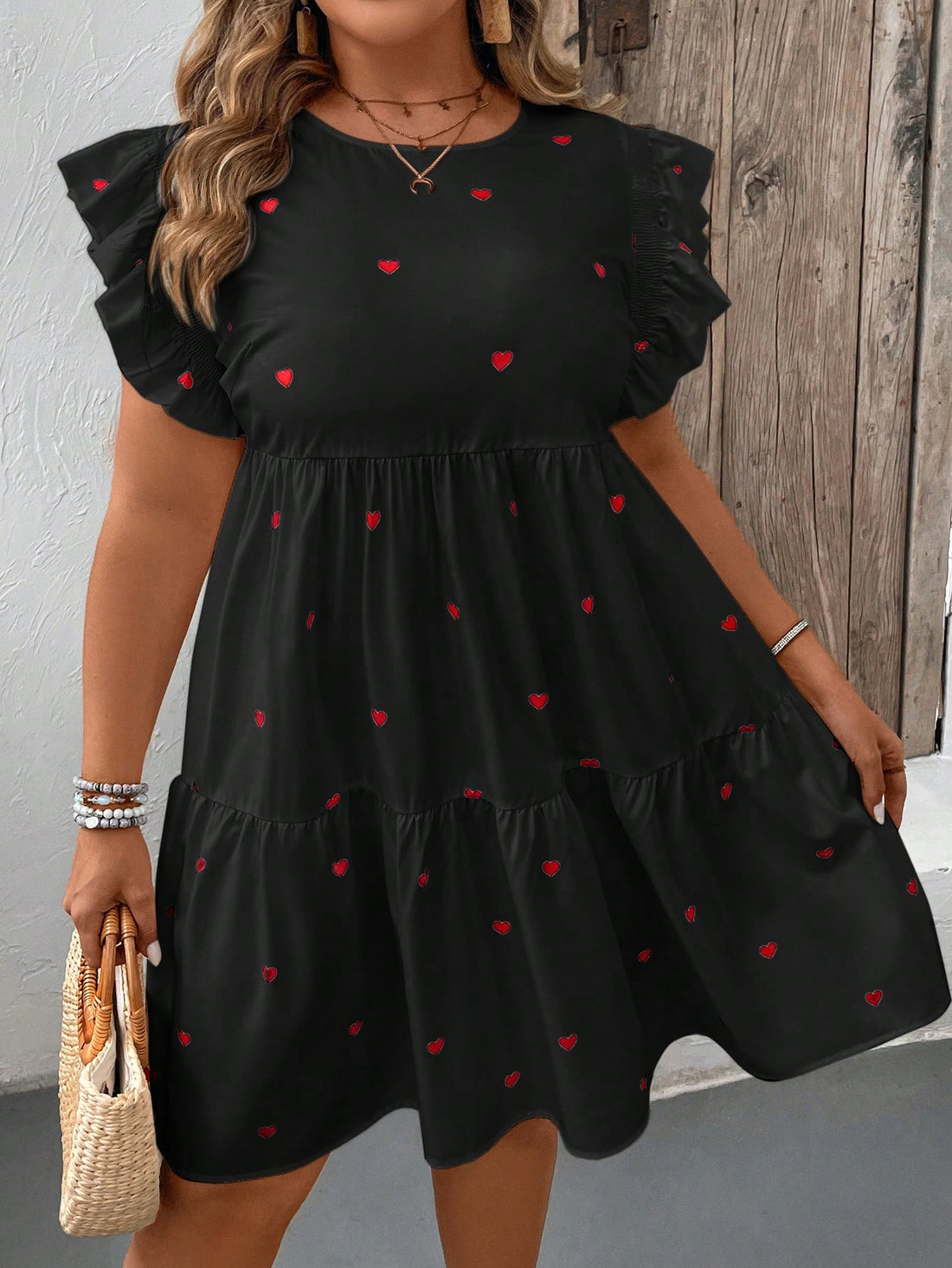 Turn heads this summer with our Chic & Comfy Plus Size Heart Print Cap Sleeve Dress! This dress combines style and comfort to create the perfect summer look. The cap sleeves add a flirty touch to the heart print design, making it a must-have for any fashion-forward wardrobe. Stay on trend and feel confident in this playful and comfortable dress.