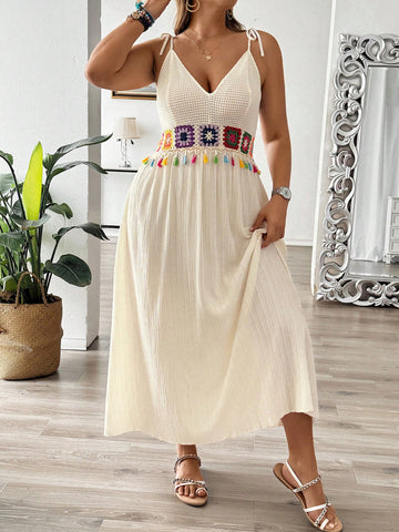 Be the ultimate fashion queen with our Chic & Comfy Plus Size V-Neck Knitted Maxi Dress! This dress not only provides comfort, but also showcases elegant embroidery and playful tassel details. Dress it up or down for any occasion. Fashion and comfort never looked so good!