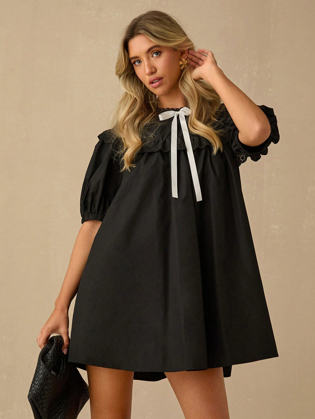 Be the talk of the town in our contrast color dress! Made for stylish women, this short sleeve dress features a chic bow decor that adds a playful touch. Perfect for the summer season, this dress will make you look and feel fabulous. Get ready to turn heads and stand out in style!