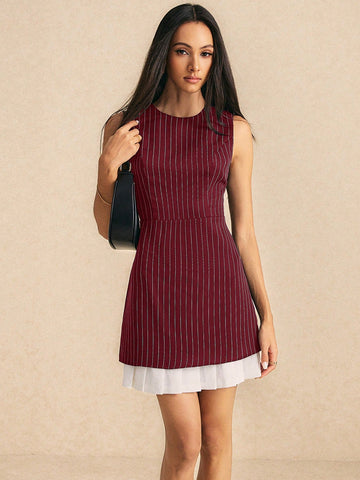 Effortlessly elevate your work wardrobe with our Chic Contrast Hem Striped Sleeveless Dress. The contrast hem and striped pattern add a touch of elegance to this sleeveless dress. Perfect for a day at the office or a night out, this dress will become a staple in your wardrobe. Business in the front, party in the back!