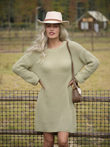 Effortlessly style yourself for autumn in our Chic Cozy sweater dress. With drop shoulder detailing and long sleeves, this knit dress will keep you cozy and chic. Perfect for any occasion, this dress is a must-have for your fall wardrobe.
