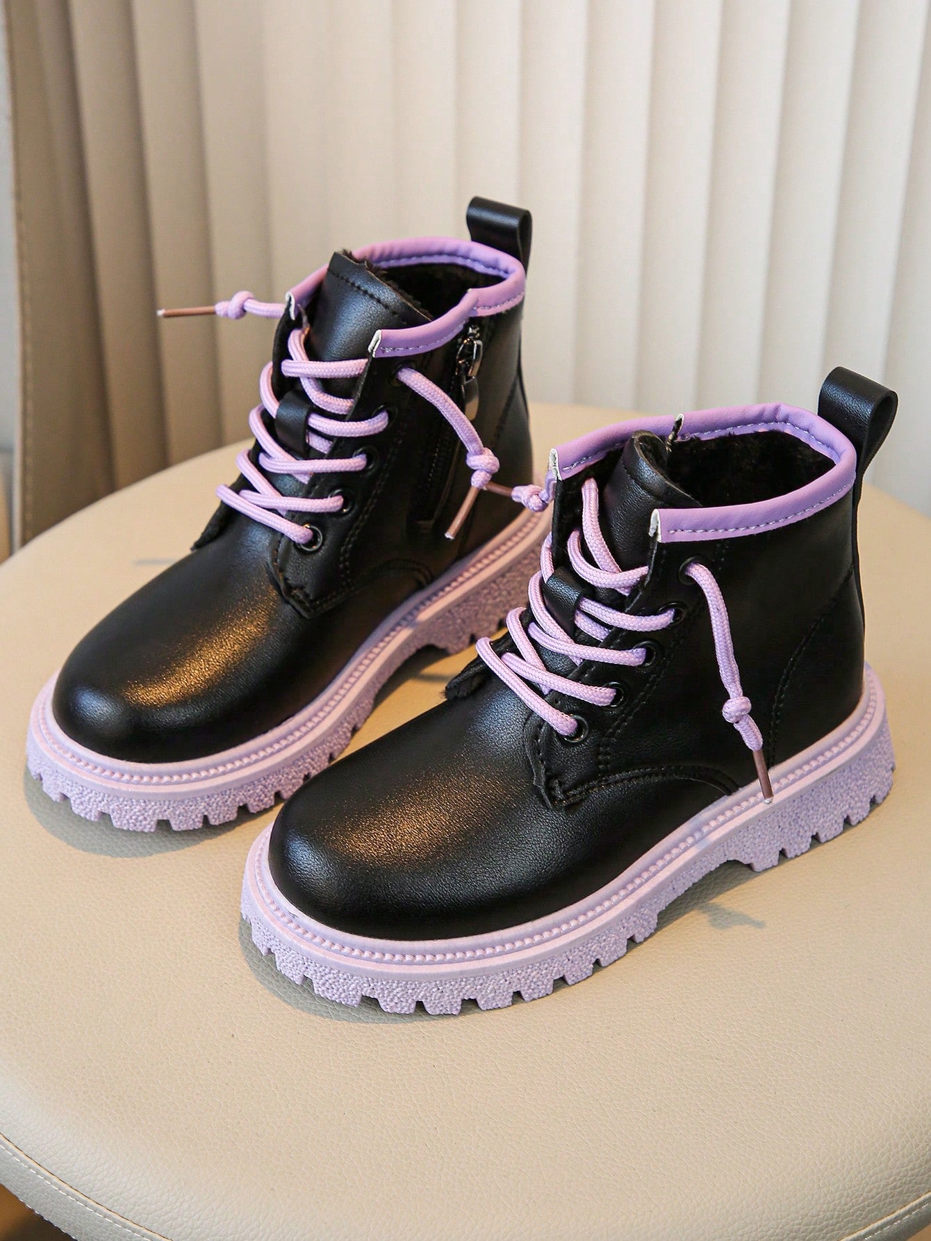 These Chic & Cozy Lace-Up Leather Boots are essential for a stylish and comfortable autumn and winter season. Made with high-quality leather, they provide durability and fashion all in one. The lace-up design adds an extra touch of sophistication while keeping your feet warm and cozy. Don't miss out on this perfect seasonal accessory.