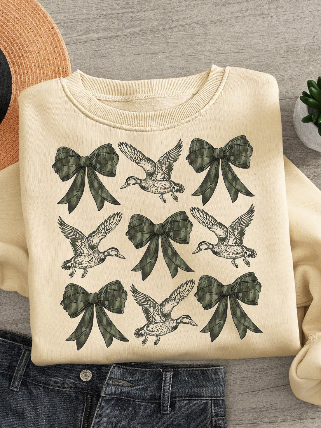Stay stylish and comfortable with our Chic & Cozy vintage camouflage sweatshirt! This plus size top features a fun and unique duck print, perfect for adding a touch of quirkiness to any outfit. Made with soft, cozy material, this sweatshirt is perfect for staying warm and stylish in any weather.