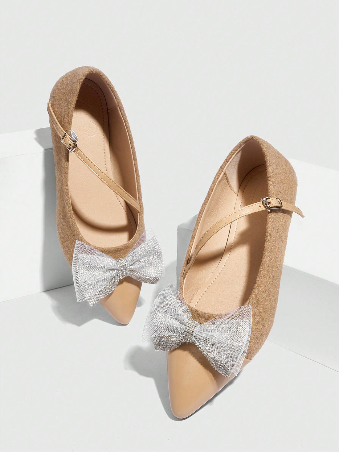 Elevate your everyday elegance with these Chic & Cozy slip-on flats. The pointed toe design and apricot bow detail provide a sophisticated touch, while the cozy fit ensures all-day comfort. Perfect for any occasion, these flats effortlessly combine style and comfort for a chic and polished look.
