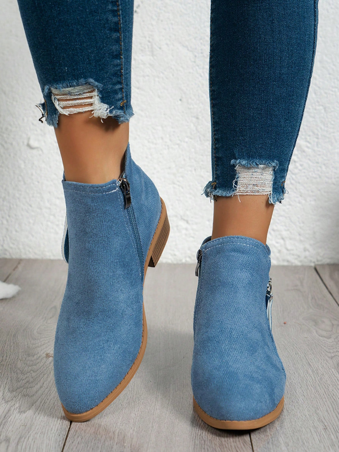 Step up your winter style with Chic & Cozy: Women's High Heel Short Ankle Boots. These boots feature a thick bottom for added comfort and elegance. Perfect for any occasion, stay warm and fashionable this season.