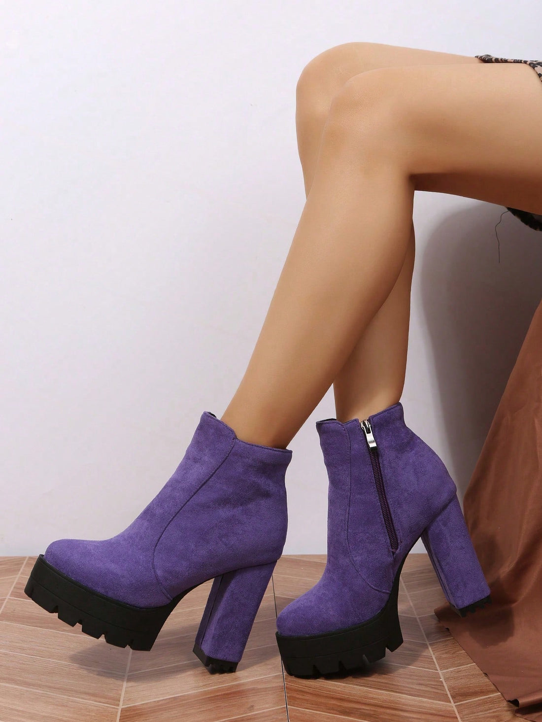 Slip into comfort and style with our Chic & Cozy boots. These women's boots feature a thick heel and round toe for support, a side zipper for easy on and off, and a sleek design perfect for the autumn-winter season. Keep your feet warm and fashionable all season long!