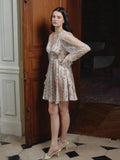Embrace effortless elegance with this dreamy cream boho mini dress, where delicate lace sleeves meet a charming vintage floral print. Perfect for layering through cooler months, this piece captures romantic autumn and winter vibes with its whimsical design. The relaxed silhouette and intricate details make it ideal for casual outings, cozy gatherings, or anyone seeking that coveted bohemian aesthetic. Versatile enough to dress up or down, it's your go-to for adding a touch of vintage-inspired charm to your 