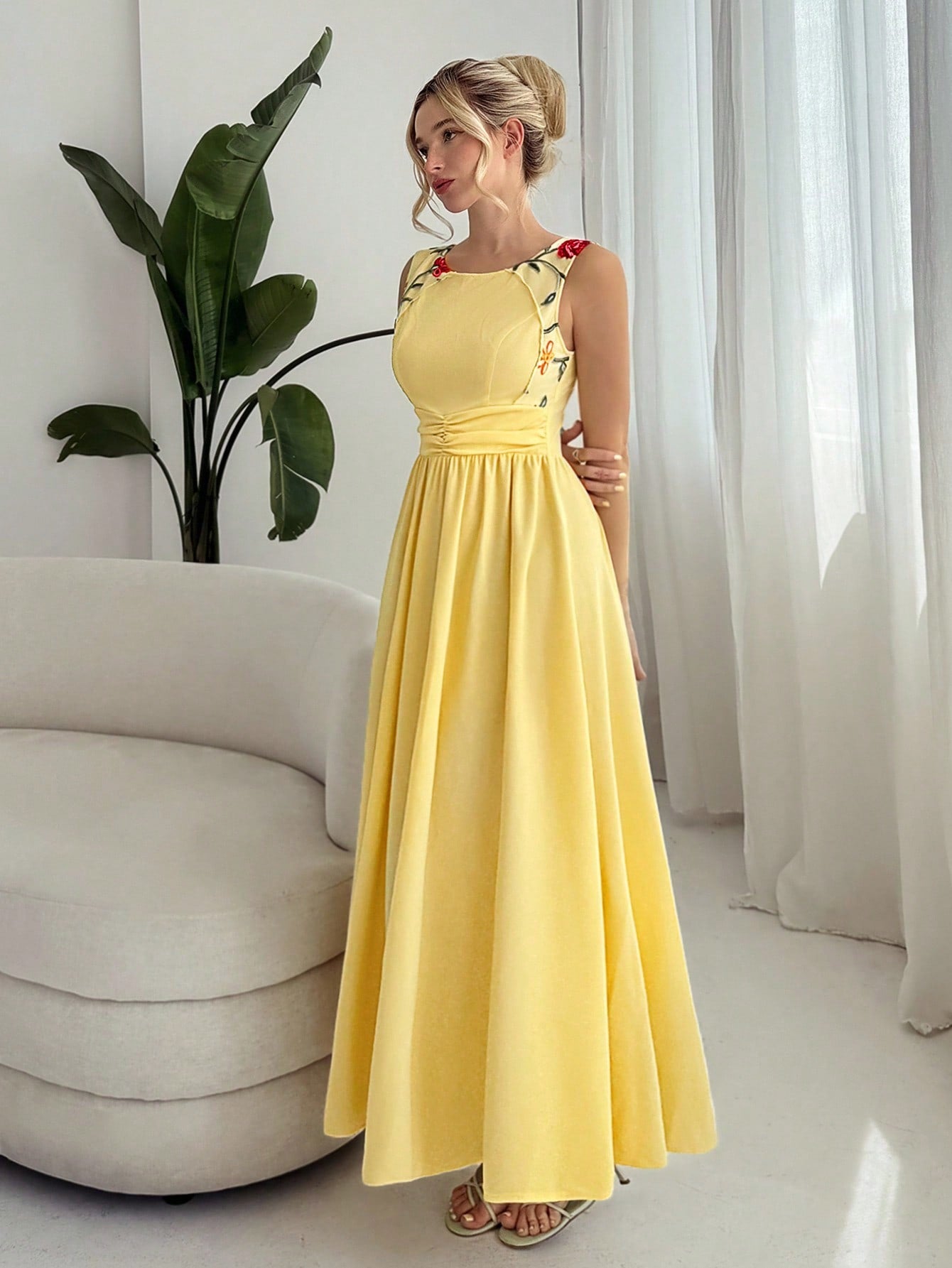 Step into the spotlight with this playful cream yellow sleeveless A-line dress. Crafted from airy mesh and detailed with elegant embroidery, it’s perfect for adding a touch of romance to any occasion. Flowy and flattering, this dress lets you dance the night away while turning heads with its delicate charm.