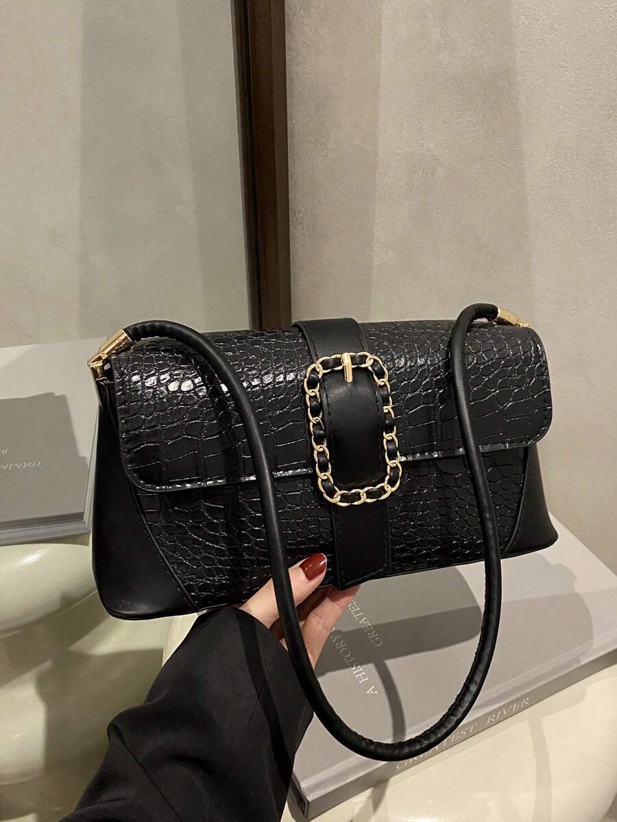 Elevate your style with this Chic Crocodile Texture Handbag, designed to effortlessly switch from shoulder to crossbody. Its sleek, minimalist shape adds a dash of sophistication while keeping things fun and flexible. Perfect for the woman who loves a little elegance with a playful twist!