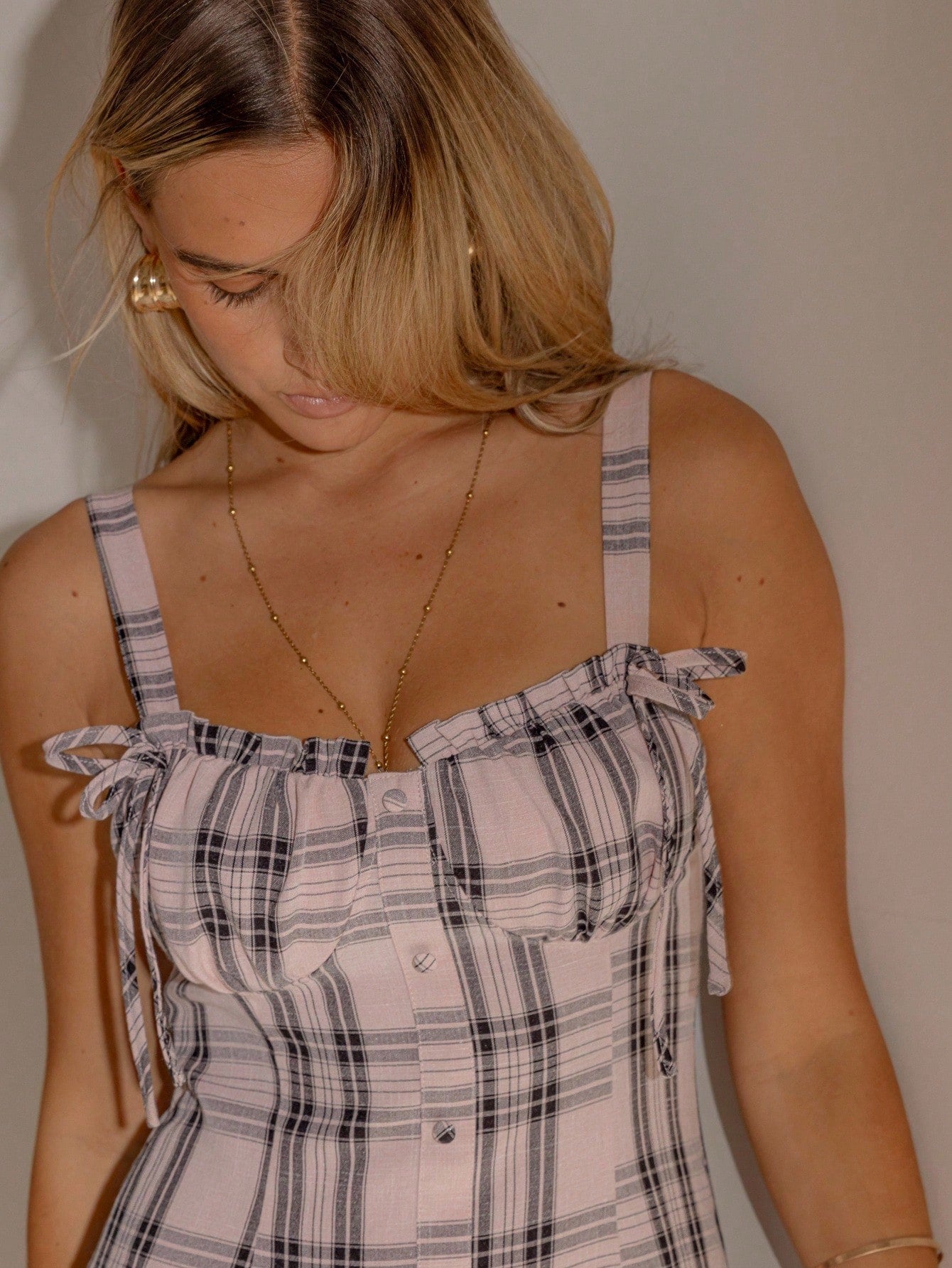 Step into bold vibes with this Chic Curve Plaid Mini Dress, designed to channel your inner grunge queen and Y2K icon. Its eye-catching plaid pattern and flirty mini cut make it perfect for statement-making streetwear looks. Whether layered with a chunky jacket or worn solo, this dress adds just the right amount of edge and retro flair to your wardrobe. Get ready to turn heads and own your style with a playful twist!