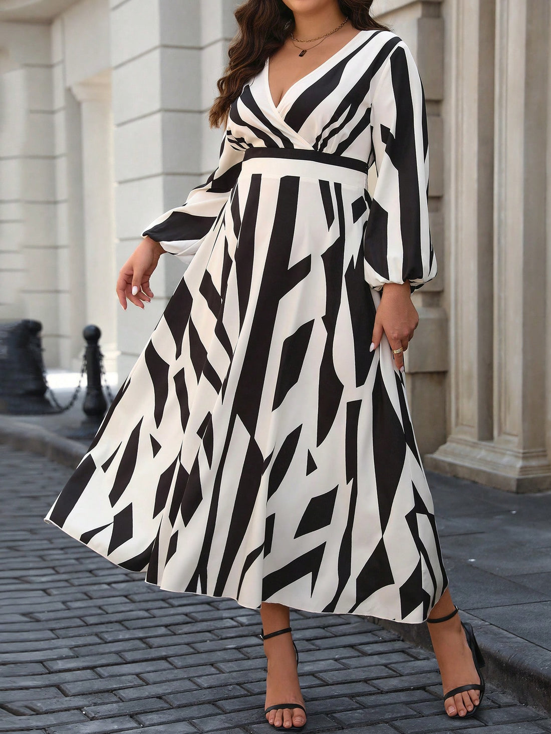 Expertly designed for plus size figures, the Chic & Curvy Geometric Print Wrap Collar High-Low Dress accentuates curves while providing coverage. The eye-catching geometric print adds a touch of boldness to this sophisticated and versatile piece. Feel confident and fashionable in this must-have dress.