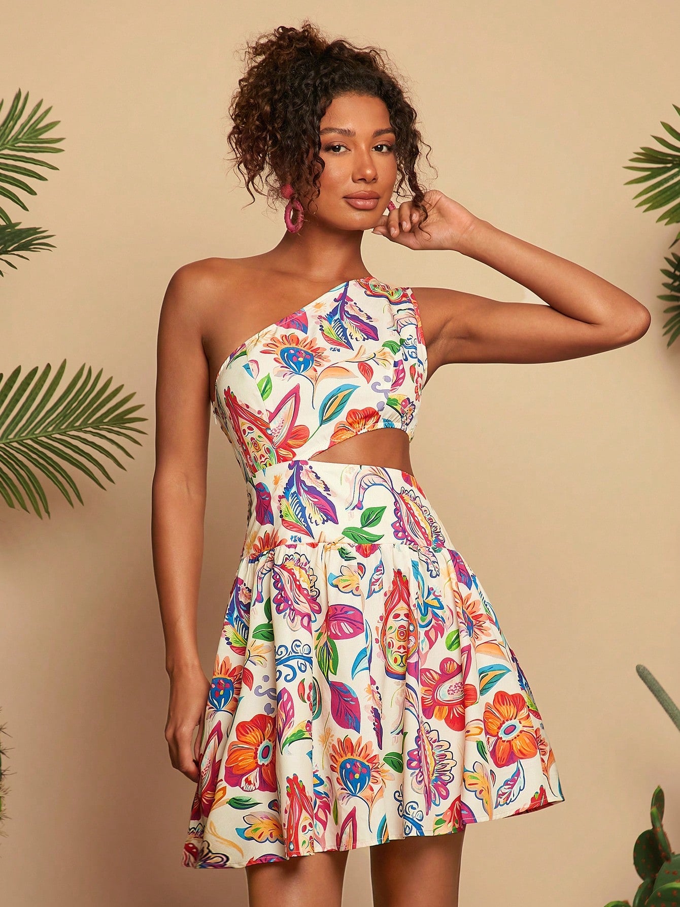 Step into summer fun with this Chic Cut-Out Floral Mini Dress! Its playful cut-outs and vibrant floral print make it the ultimate choice for beach days and festival vibes. Light and flirty, it keeps you cool while turning heads wherever you go. Perfect for dancing, lounging, or catching the sunset in style!