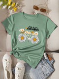 Introducing our Chic Daisy Flower Letter Printed T-Shirt, perfect for adding a touch of effortless style to your wardrobe. Made with high-quality materials, this t-shirt features a stylish daisy flower and letter print that will elevate any outfit. With its comfortable fit and chic design, you'll look and feel your best wherever you go.