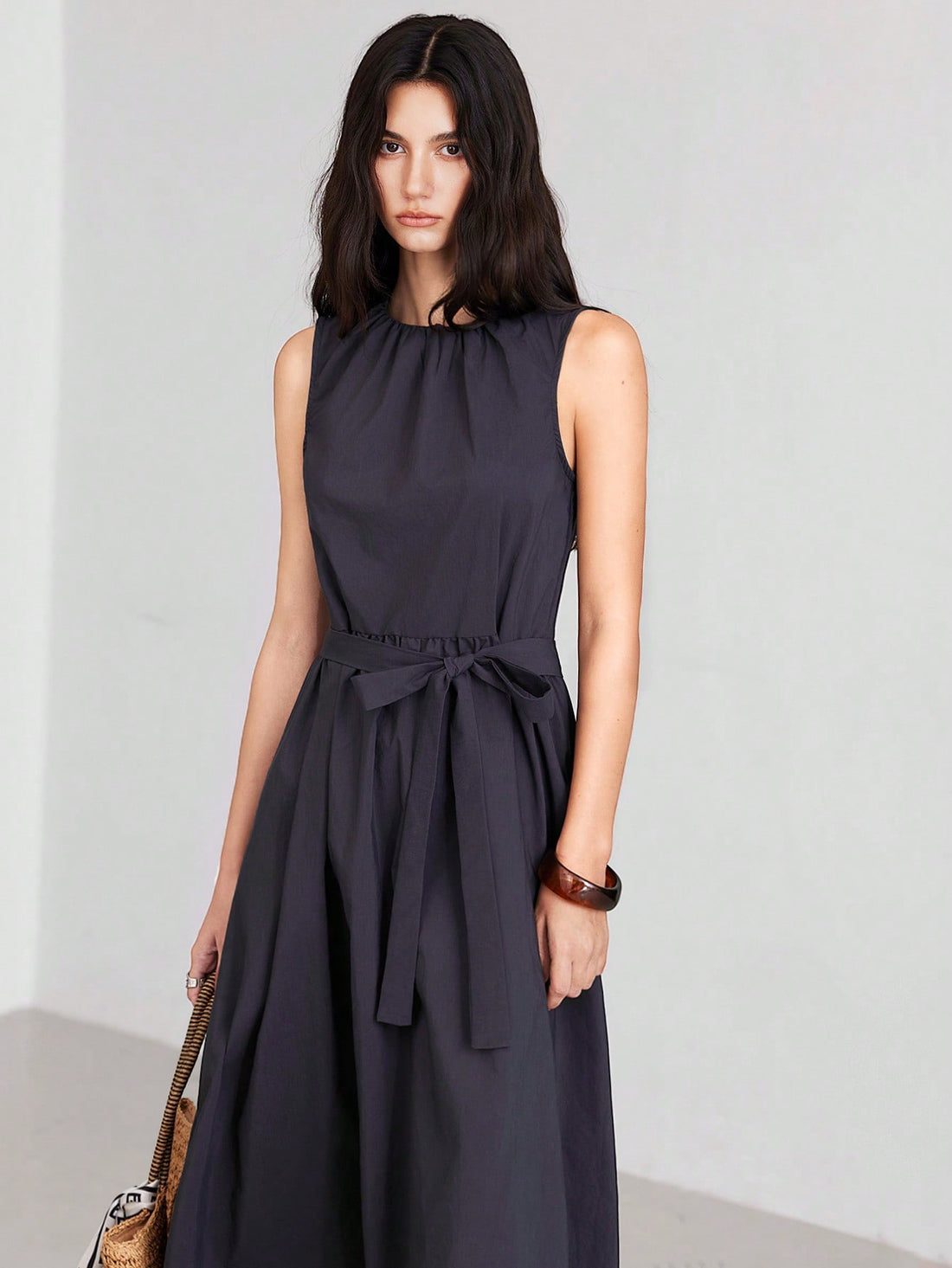 Slip into effortless style with this Chic Deep Grey Drawstring Waist Dress. Designed for comfort and flair, its adjustable waist lets you find the perfect fit while the sleek grey shade pairs easily with any accessory. Whether you're out for brunch or a casual day at work, this dress keeps you looking cool and feeling cozy all day long. Play with layers or keep it simple—versatility has never looked this good!