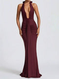 Turn heads this summer with our Chic Deep V-Neck Backless Bodycon Dress. Perfect for parties and club nights, its daring cut and sleek fit highlight your curves while keeping you cool and confident. Elevate your evening look with a touch of bold glam that’s made to dance the night away.