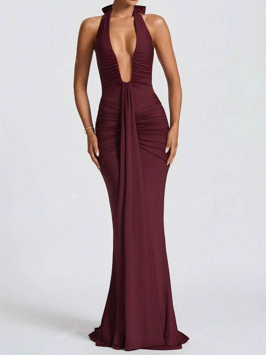 Turn heads this summer with our Chic Deep V-Neck Backless Bodycon Dress. Perfect for parties and club nights, its daring cut and sleek fit highlight your curves while keeping you cool and confident. Elevate your evening look with a touch of bold glam that’s made to dance the night away.