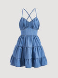Get ready to delight in this chic and playful dress! Crafted with soft denim and featuring a unique pleated back and cross-strap design, this dress is sure to turn heads. Perfect for any occasion, from a casual day out to a special date night. Say hello to your new wardrobe staple!