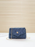 This stylish crossbody bag is the perfect accessory for any fashionable woman. Made from high-quality denim, it offers both durability and style. With its chic flap design, it adds a touch of elegance to any outfit. Stay on-trend and organized with this must-have bag.