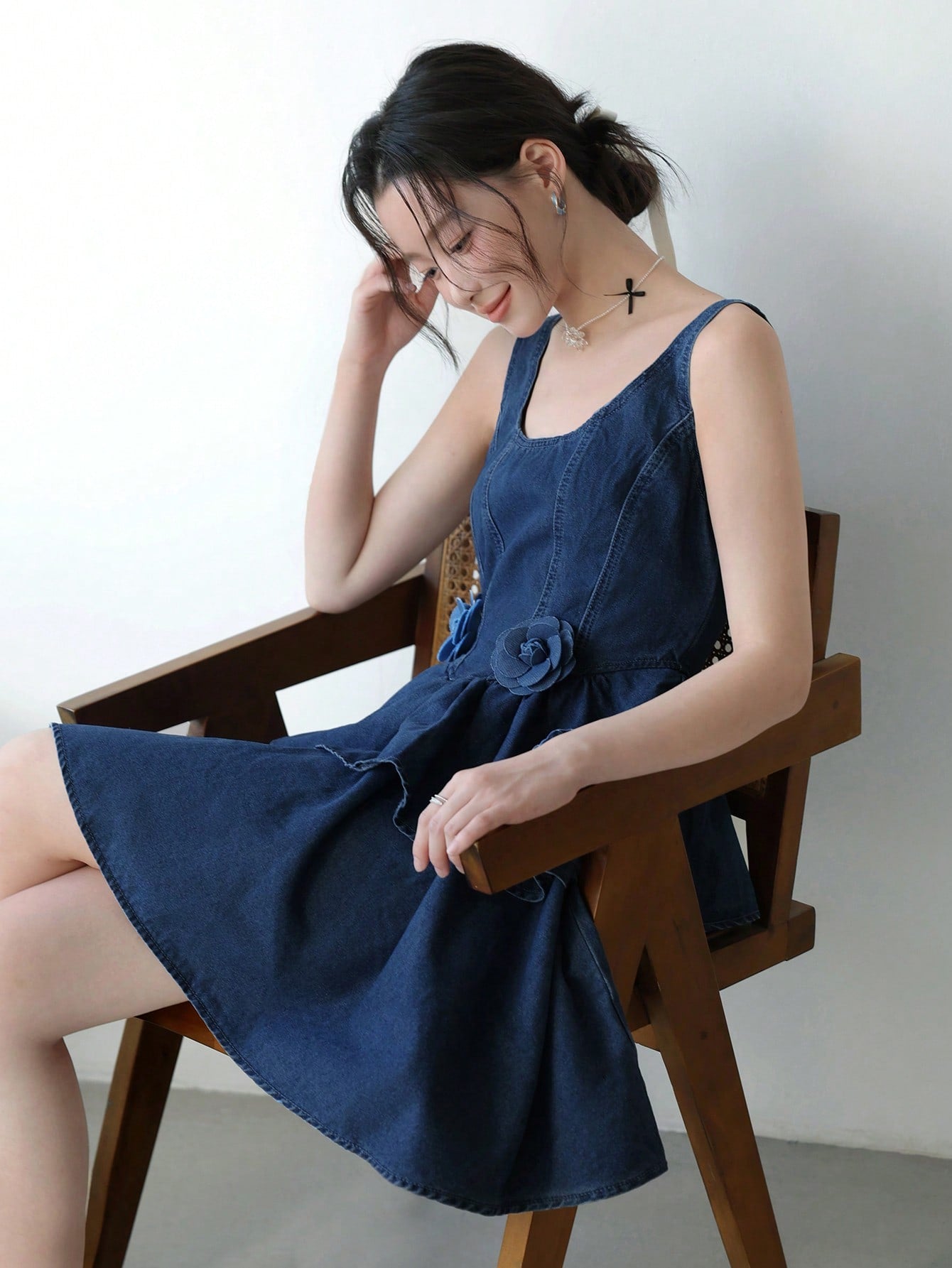 Step out in style with this Chic Denim Sleeveless Mini Dress, designed to keep you cool and confident all summer long. Its lightweight denim fabric and flirty mini length make it ideal for sunny outings, lively concerts, or carefree vacations. Effortlessly playful and versatile, this dress pairs perfectly with your favorite sneakers or sandals for a fun, fresh look wherever you go.