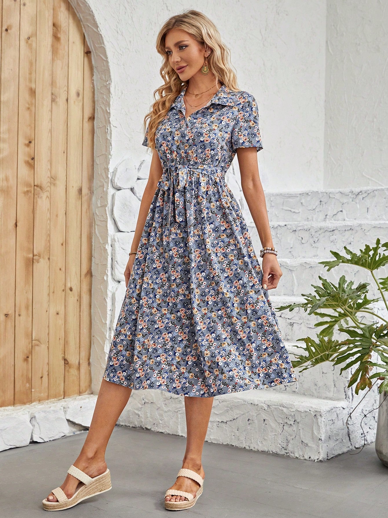 This Chic Ditsy Floral Print Belted Shirt Dress is perfect for every occasion. Featuring a stylish floral print and a flattering belted design, this dress is both versatile and fashionable. With its one-of-a-kind design, you'll stand out in the crowd and make a statement.