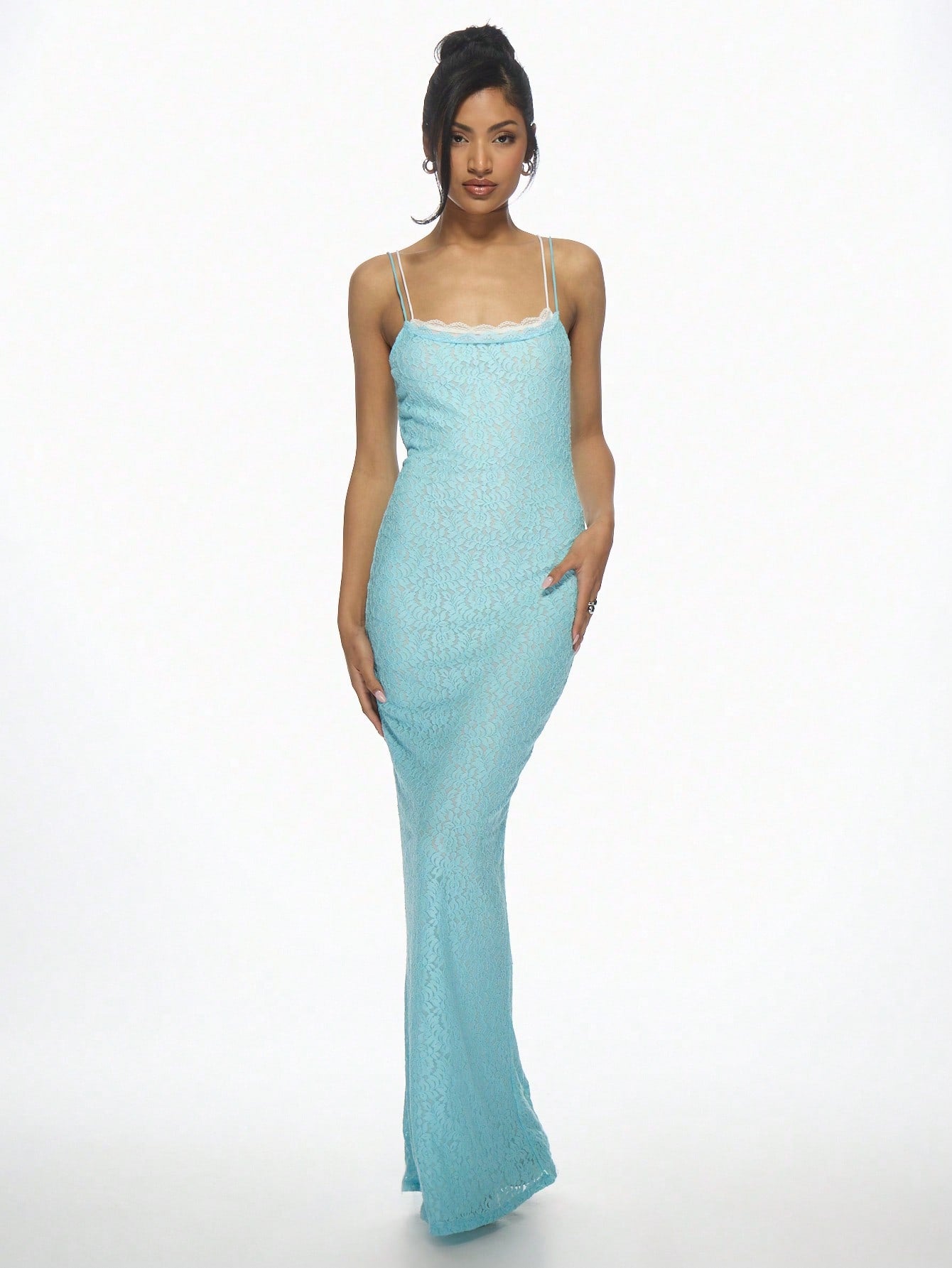 Turn heads at your next special occasion in this stunning double-layer lace bodycon maxi dress. The delicate scalloped trim adds a touch of sophistication, while the form-fitting silhouette flatters your curves beautifully. Perfect for proms, weddings, and elegant evening events, this dress combines timeless lace detailing with modern bodycon styling. Whether you're dancing the night away or making a grand entrance, you'll feel confident and absolutely gorgeous in this show-stopping gown.