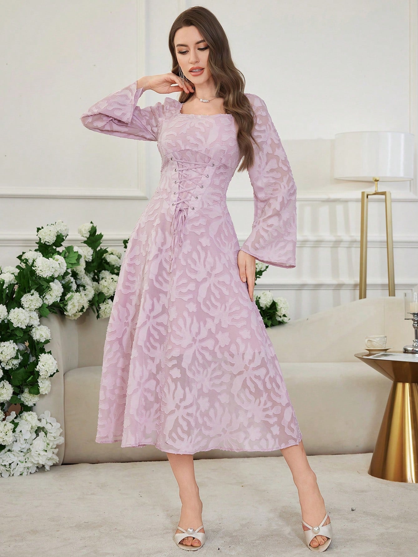Effortlessly achieve chic style with our drawstring lined dress! Designed with trumpet sleeves, this dress not only offers a trendy look, but also a comfortable fit. Perfect for any occasion, you'll never have to sacrifice style for comfort again.