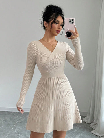 Experience the perfect blend of style and comfort with our Chic Elegance: Apricot Crossover Wrap Sweater Dress. This dress features a flattering wrap design, perfect for accentuating your figure. Its soft fabric will keep you warm and cozy during the colder months. Elevate your wardrobe with this must-have piece for autumn and winter.