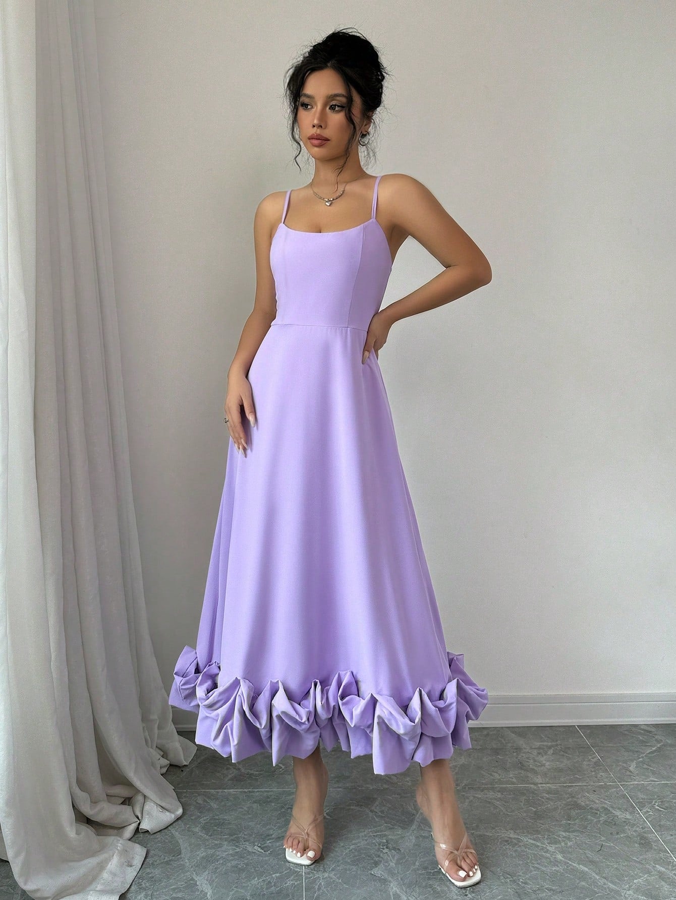This stylish and elegant bubble dress features a chic sling hem design, adding a unique and fashionable touch to your wardrobe. Crafted with precision and attention to detail, this dress exudes confidence and sophistication. Elevate your style with this must-have piece.