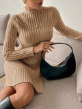 This Chic Elegance sweater dress is the perfect mix of style and comfort. The ribbed knit hugs your body while the long sleeves keep you warm. With its elegant silhouette, it's perfect for any occasion. Made with high-quality materials, this dress is both durable and fashionable.