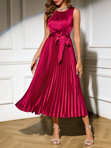 This dress exudes chic elegance with its solid color and pleated hem. Perfect for any occasion, the sleeveless design adds a touch of sophistication while keeping you comfortable. Embrace your fashionable side with this mid-length dress.