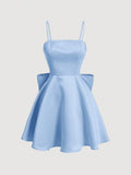 Elevate your style with our Chic Elegance dress. Featuring a solid color design, delicate spaghetti straps, and a charming back bowknot detail, this dress exudes sophistication. Perfect for any occasion, this dress is sure to make a statement.