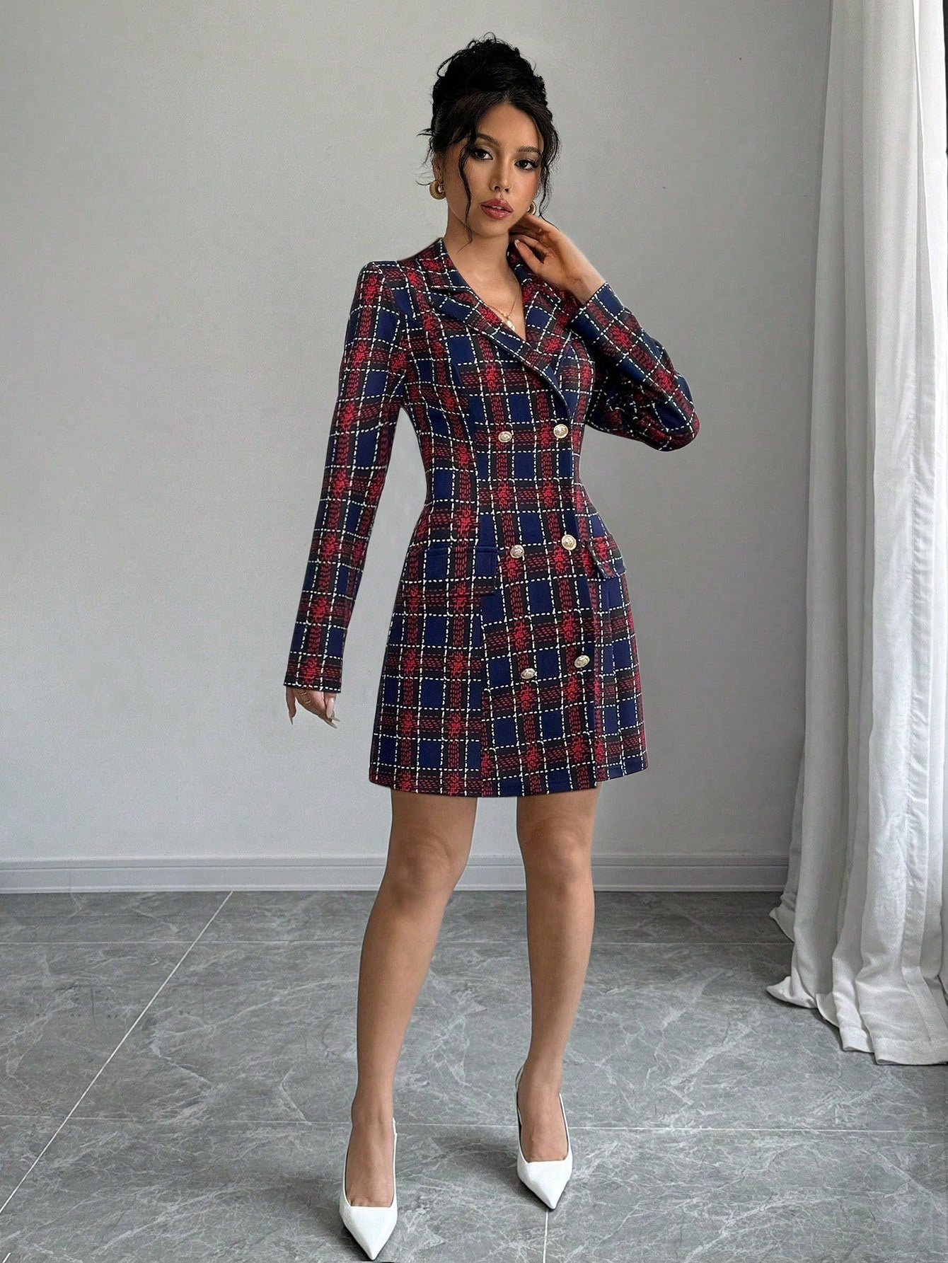 Add a touch of sophistication to your wardrobe with our Chic & Elegant Plaid Print Double-Breasted Dress. The stylish notched collar and double-breasted design make it a must-have for any spring or fall outfit. With its classic plaid print, this dress is perfect for both casual and formal occasions.